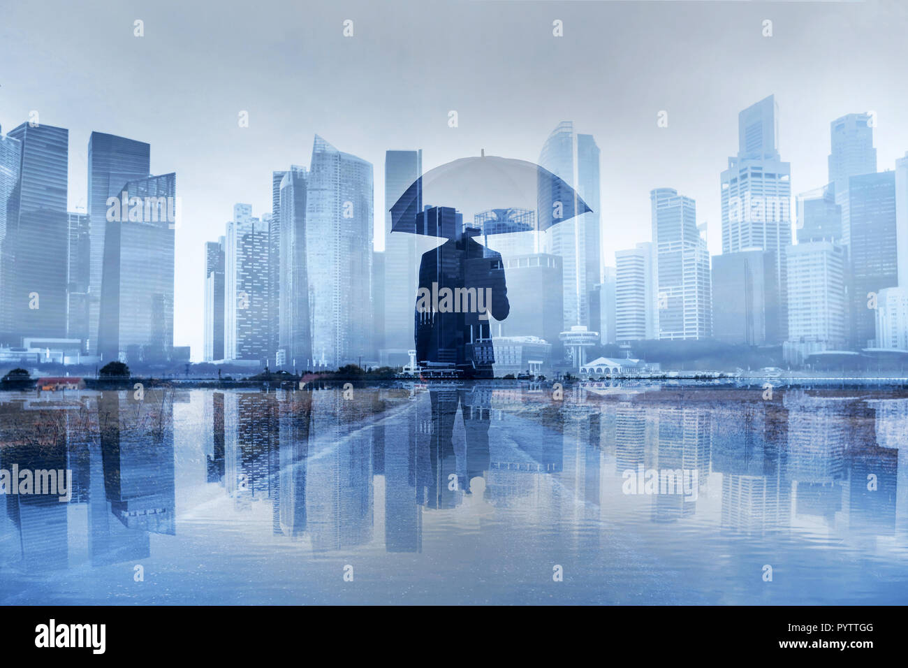 insurance concept, risk in business, businessman with umbrella double exposure Stock Photo