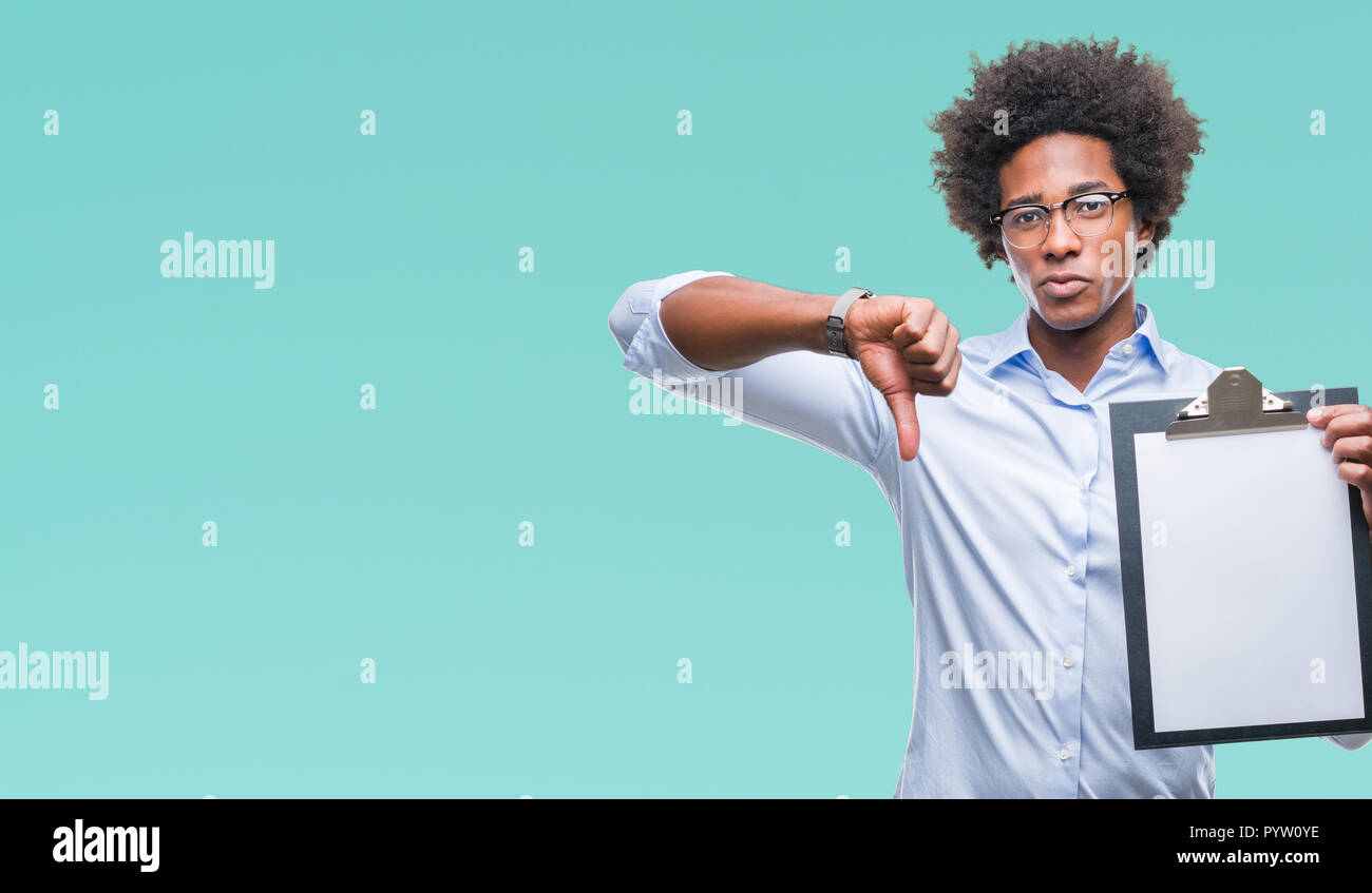 Afro american man holding clipboard over isolated background with angry ...