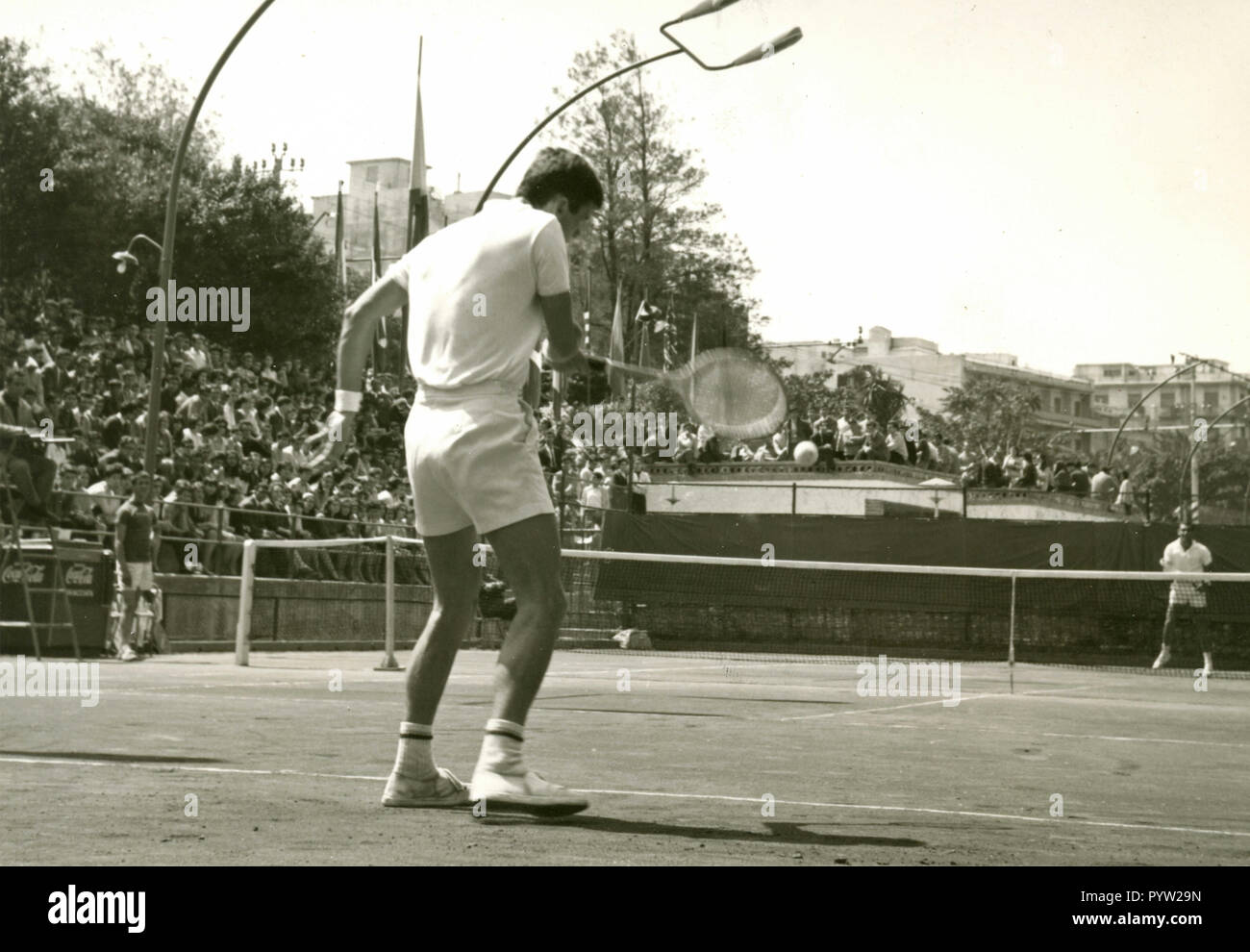 Tennis players Davidson and Chanfreau during single, Reggio Calabria, Italy 1967 Stock Photo