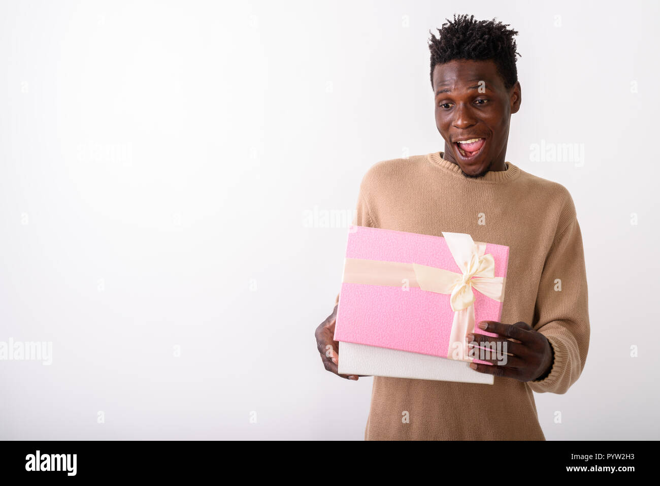 Shocked happy african man hi-res stock photography and images - Alamy