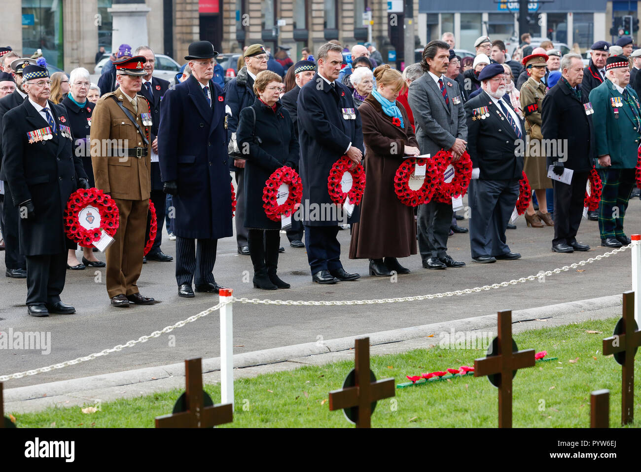 Glasgow, Scotland, UK. 30th October, 2018. Deputy Lord Lieutenant Mr Phil Green of the City of Glasgow led a special group of wreath-layers at the annual Opening Ceremony of the Glasgow Garden of Remembrance, in George Square. Members of the Armed Forces community including veterans attended the poignant event which marks the start of the traditional two week Remembrance period. Credit: Findlay/Alamy Live News Stock Photo