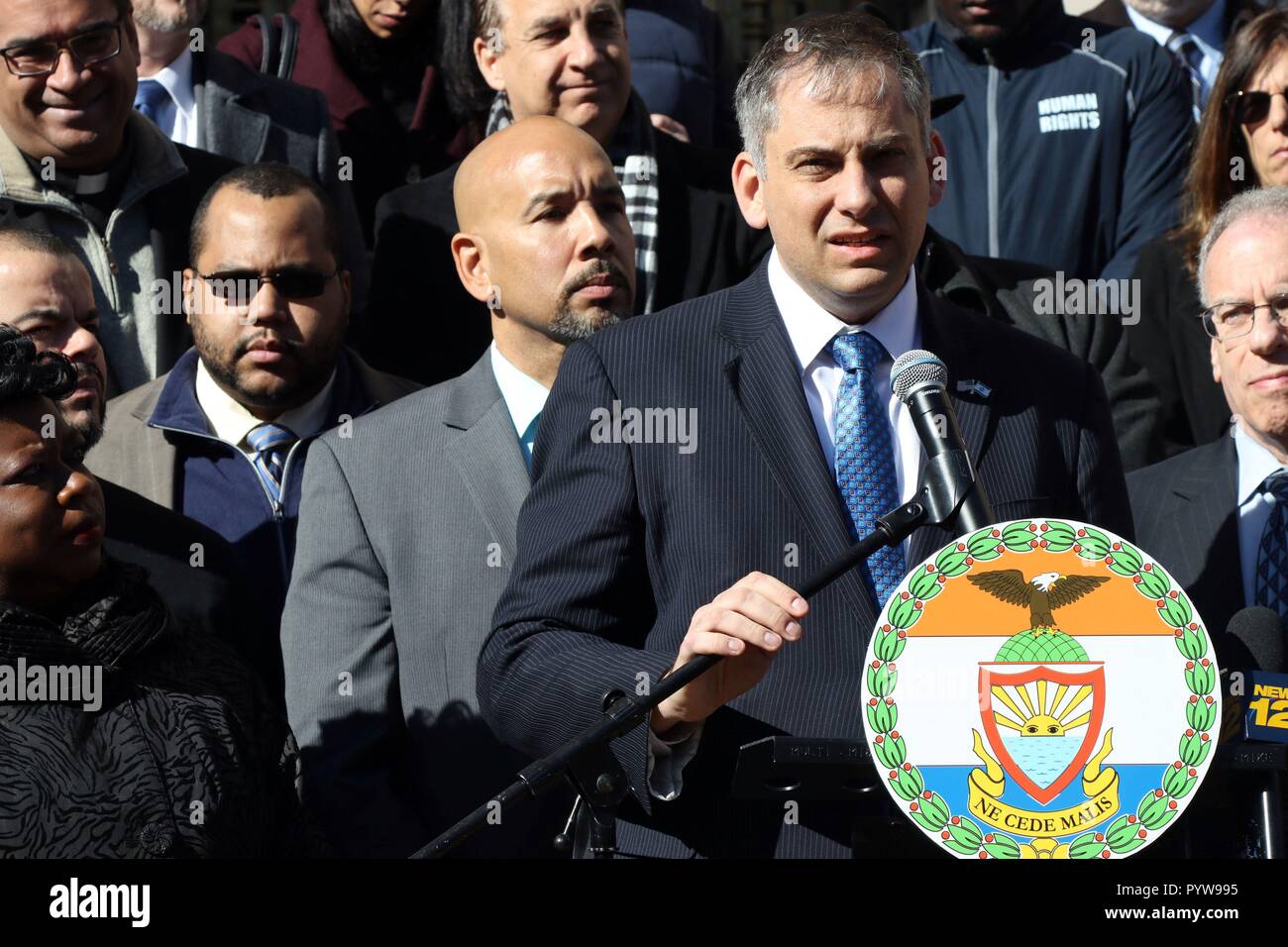 New York City, New York, USA. 30th Oct, 2018. Israel Nitzan, Deputy Consul General of the state of Israe (R)l, address the ceowd at an interfaith pray vigil hosted by Bronx Borough President Ruben Diaz Jr. and the Jewish Community Relations Council of New York, was held at the Bronx County Building on 30 October, 2018. Elected leaders, clergy, court officials, community organizations and others joined in support with the Jewish community and stood united against hatred at the midday vigil. Credit: G. Ronald Lopez/ZUMA Wire/Alamy Live News Stock Photo