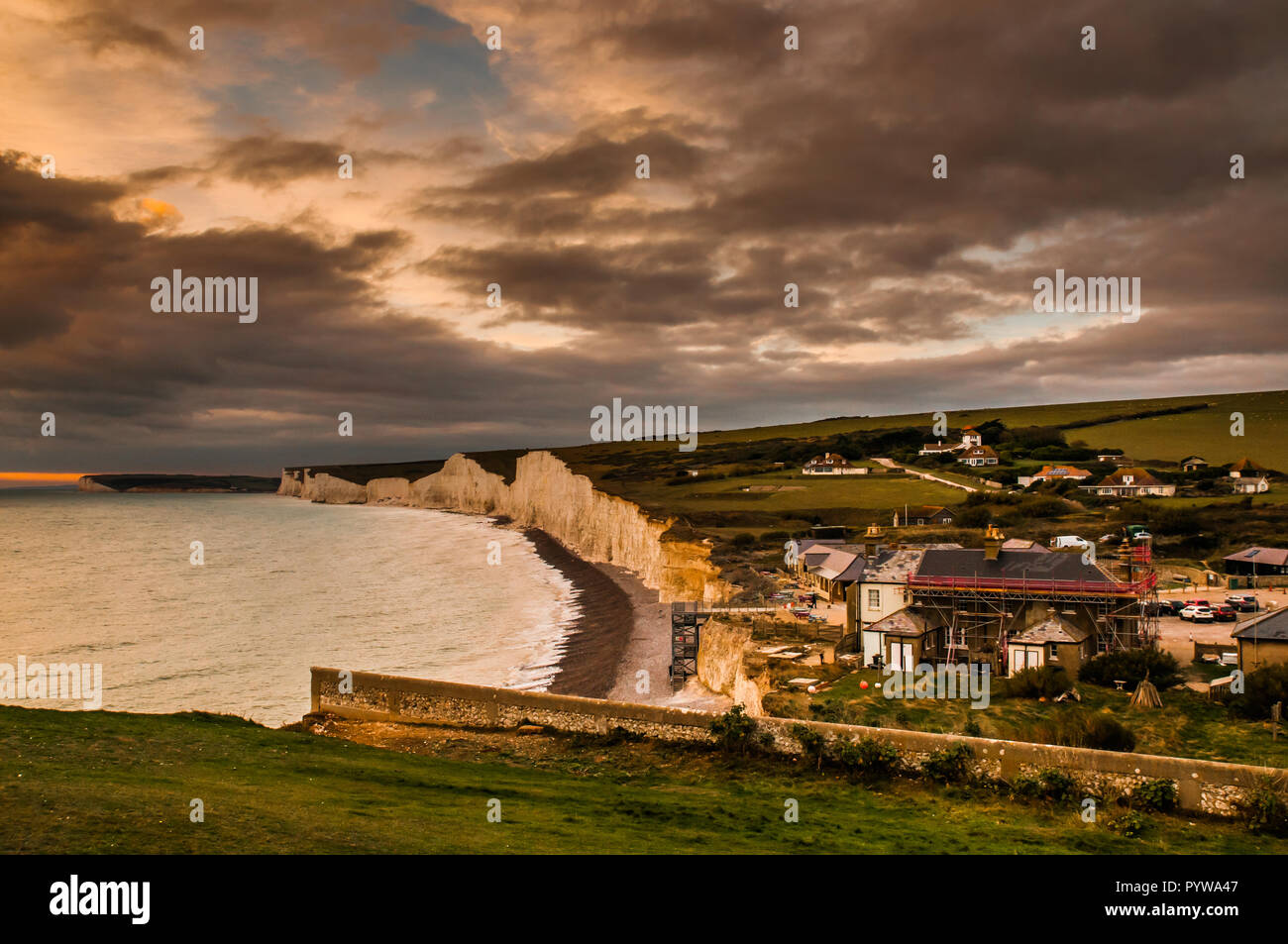 Birling Gap, Eastbourne, East Sussex, UK..30 October 2018..Cloudy skies over the Seven Sisters chalk cliffs shortly before sunset. Cold stiff breeze from the North  East.. Stock Photo