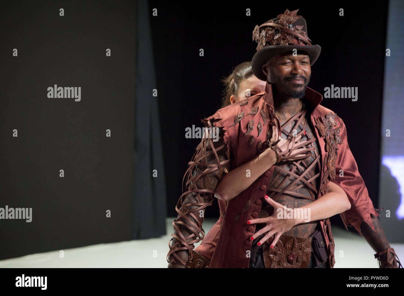 Djibril Cisse and Silvia Notargiacomo seen during 'Salon Du Chocolat