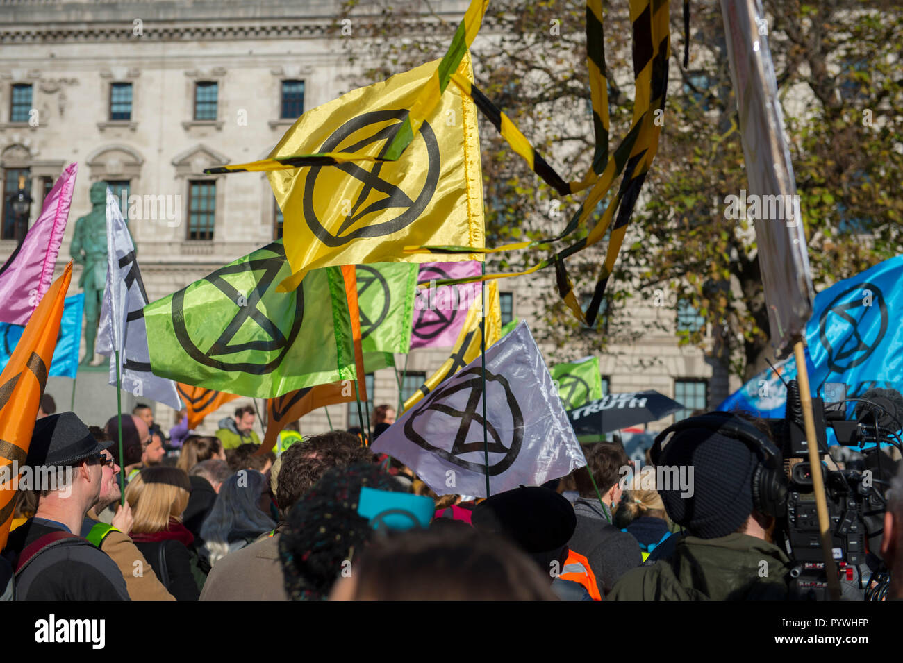Parliament Square, London, UK. 31 October, 2018. Extinction Rebellion, a new pressure group, is calling for civil disobedience in the UK in November to draw attention to the climate change emergency facing the planet. They call a Declaration of Rebellion at Parliament Square on 31 October 2018. Credit: Malcolm Park/Alamy Live News. Stock Photo
