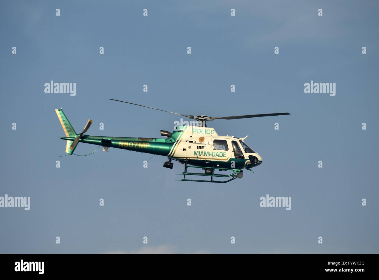 MIAMI - MARCH 27: Miami Dade County police helicopter departs on patrol over the city on March 27, 2017 from its home base Opa Locka Airport Stock Photo