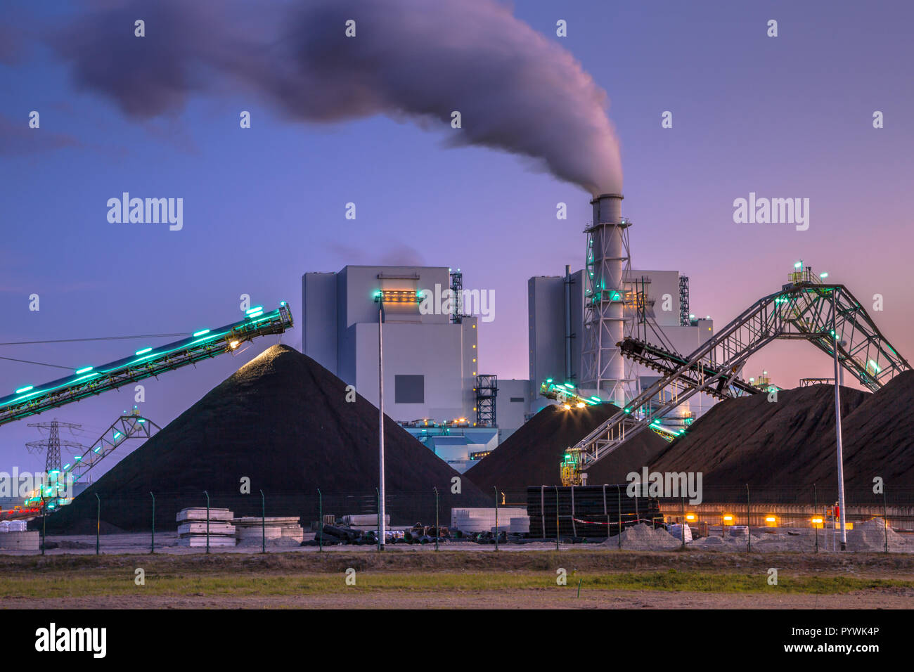 Coal power plants play a vital role in electricity generation worldwide. Altough modern plants are much more efficient than before, it is not a clean  Stock Photo