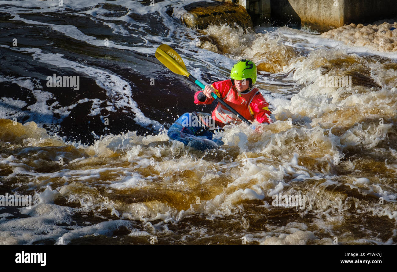 Canoeist negotiating the Tees Barrage International White Water Course Park in Stockton-on-Tees - formerly Teesside White Water Course Stock Photo