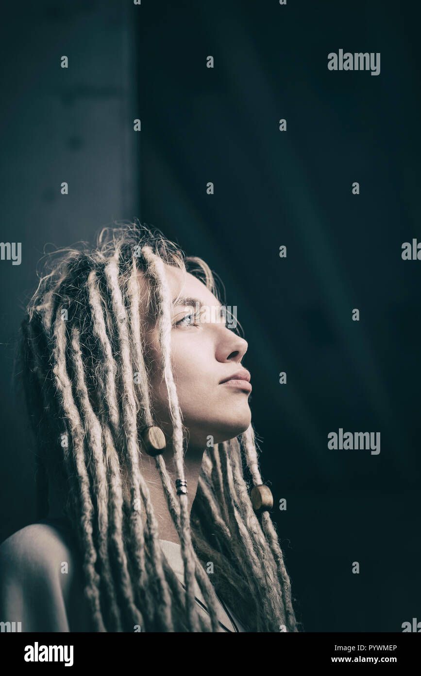 Beautiful Young Woman With Blonde Dreadlocks Hairstyle