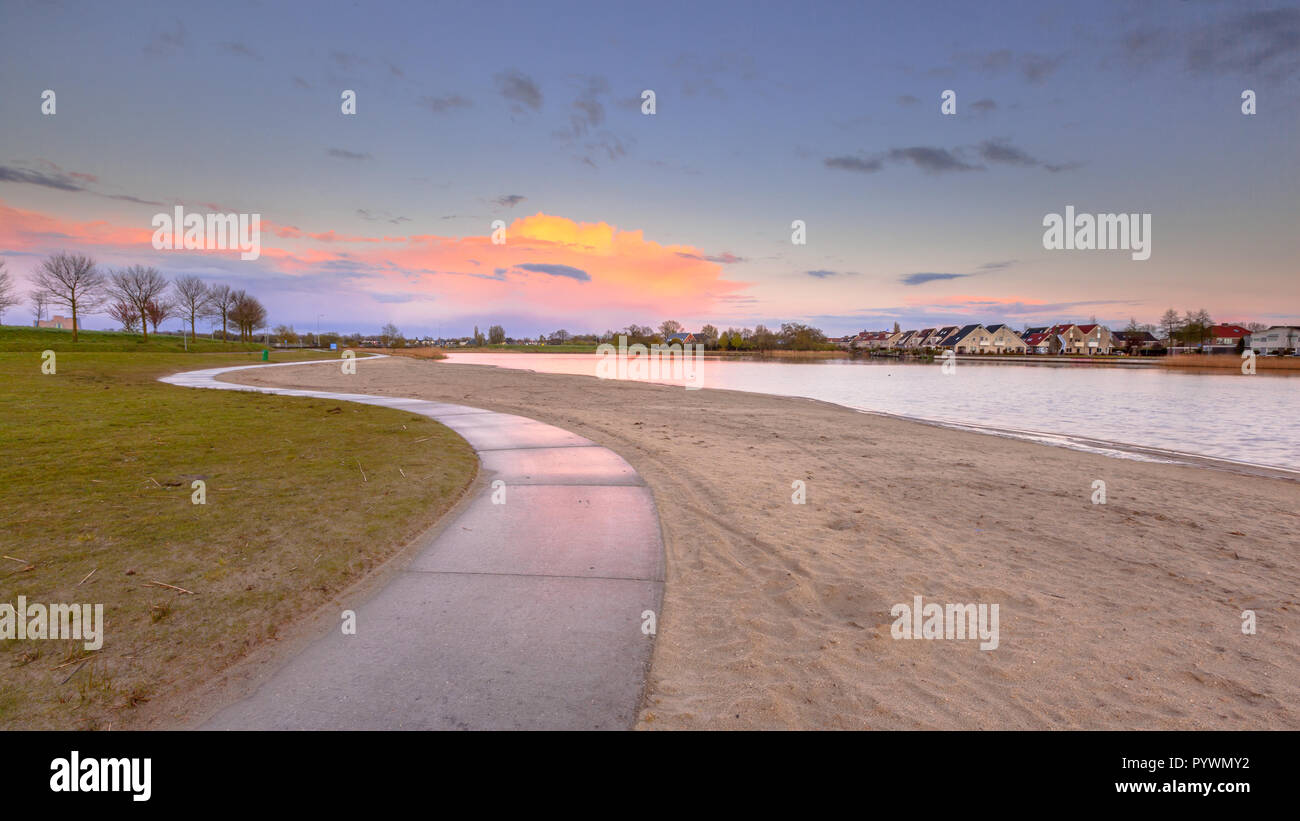 Recreational area with swimming lake and beach in a suburban area of a large city Stock Photo