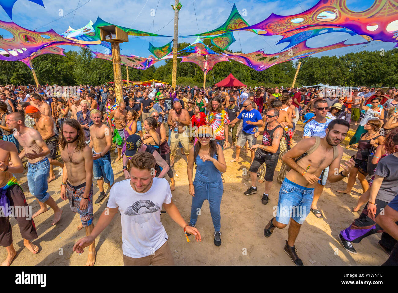 LEEUWARDEN, NETHERLANDS-AUGUST 30, 2015: Laughing happy party people having fun on the dance floor at Psy-Fi open air psychedelic trance music Festiva Stock Photo