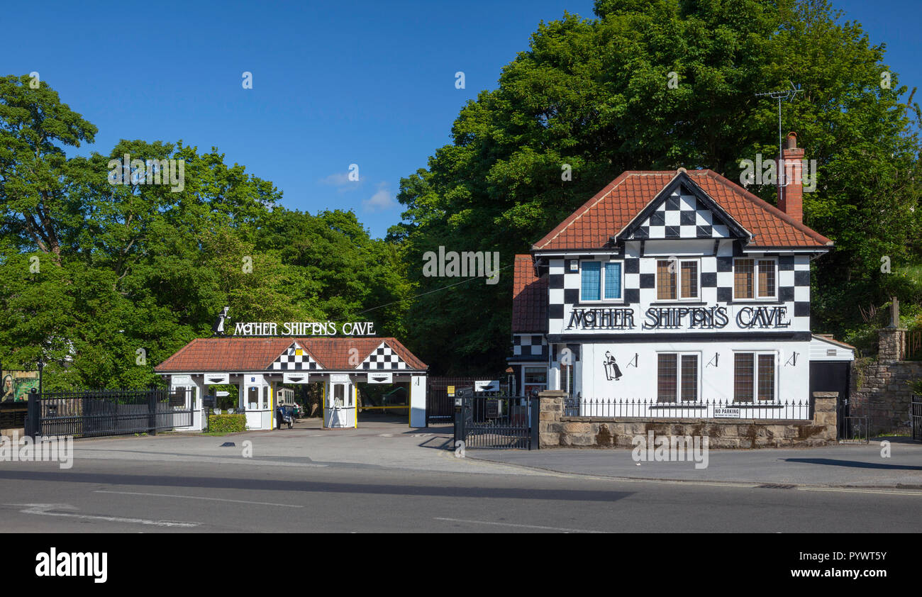 Sunny summer view of the entrance to Mother Shipton's Cave, a tourist attraction in Knaresborough, North Yorkshire Stock Photo