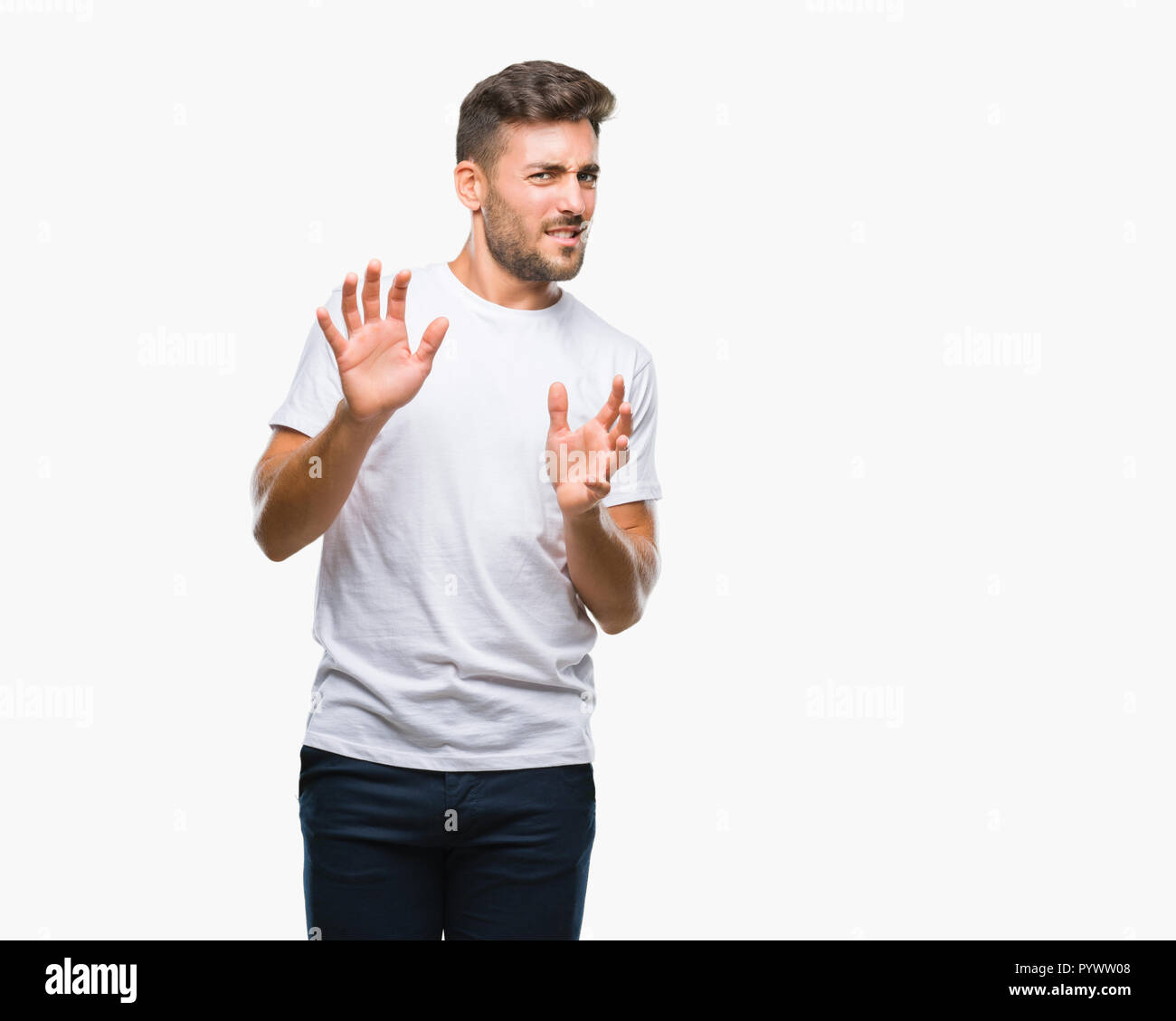 Young handsome man over isolated background disgusted expression ...