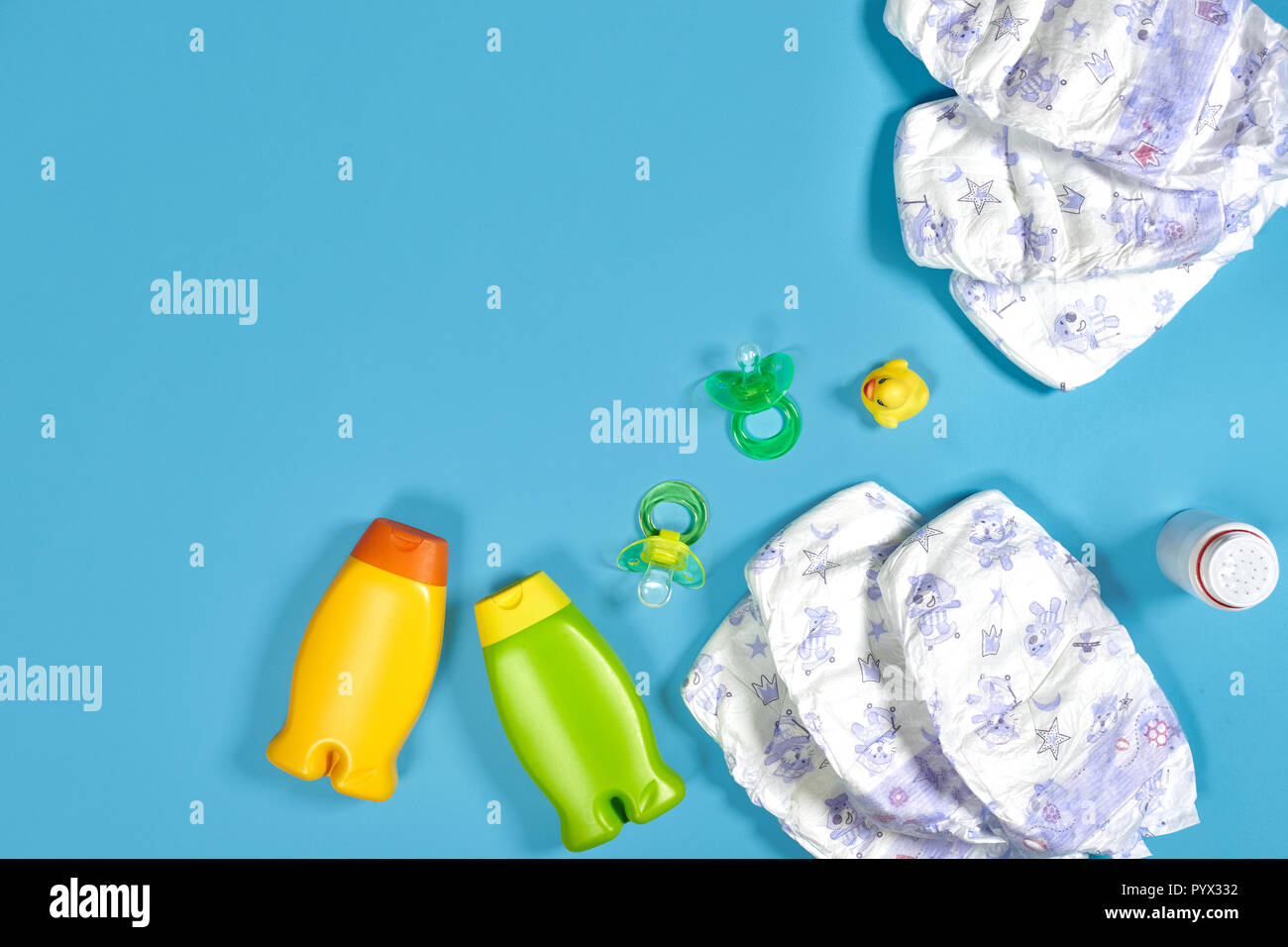 Download Baby Care With Bath Set Nipple Toy Diapers Shampoo On Blue Background Top View Mockup Stock Photo Alamy