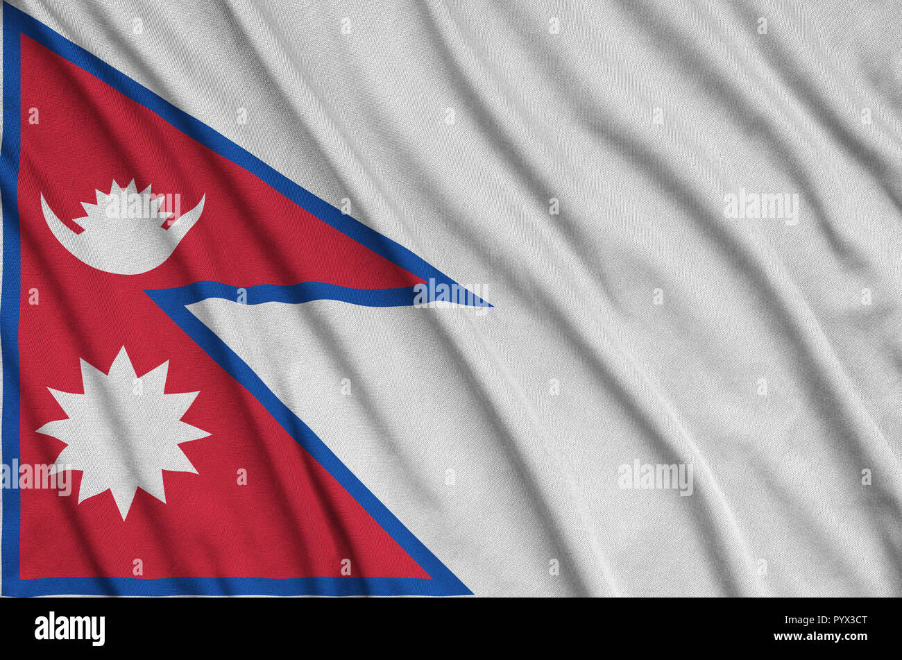 Nepal flag  is depicted on a sports cloth fabric with many folds. Sport team waving banner Stock Photo