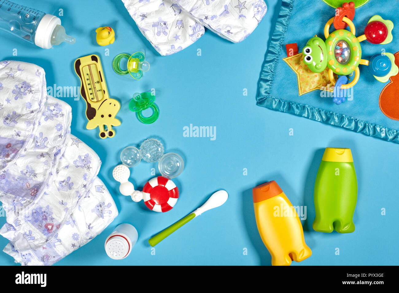 Download Baby Care With Bath Set Nipple Toy Diapers Shampoo On Blue Background Top View Mockup Stock Photo Alamy