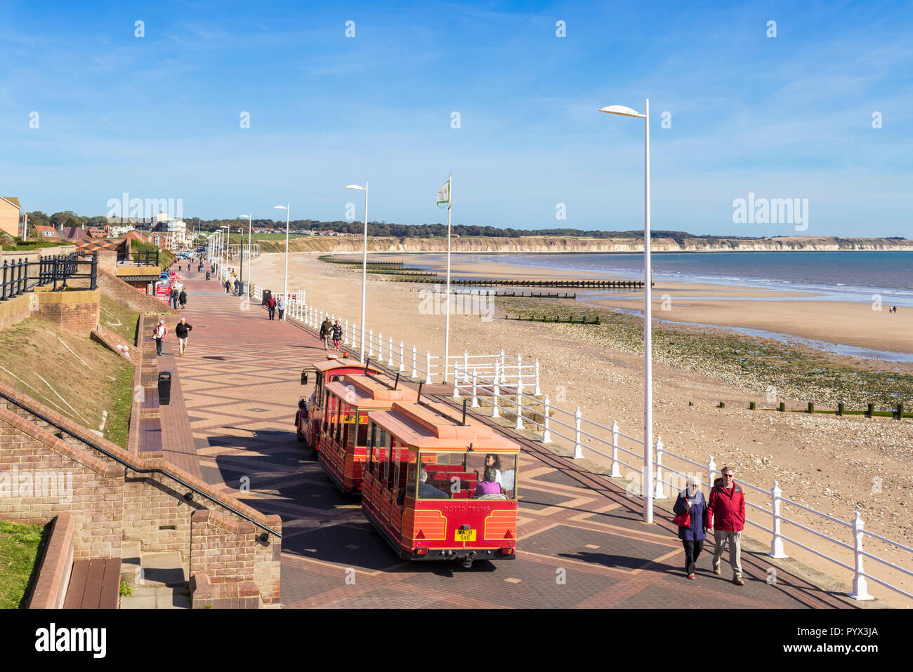 Bridlington beach Yorkshire with the Land train on the promenade at  South Marine drive East Riding of Yorkshire England UK GB Europe Stock Photo