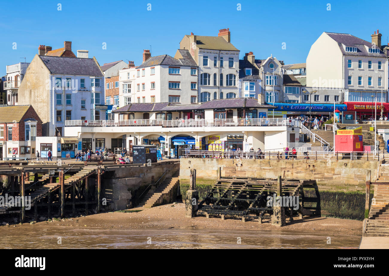 Bridlington old town marina and Bridlington Harbour at low tide showing the harbour wall and jetty East Riding of Yorkshire England UK GB Europe Stock Photo