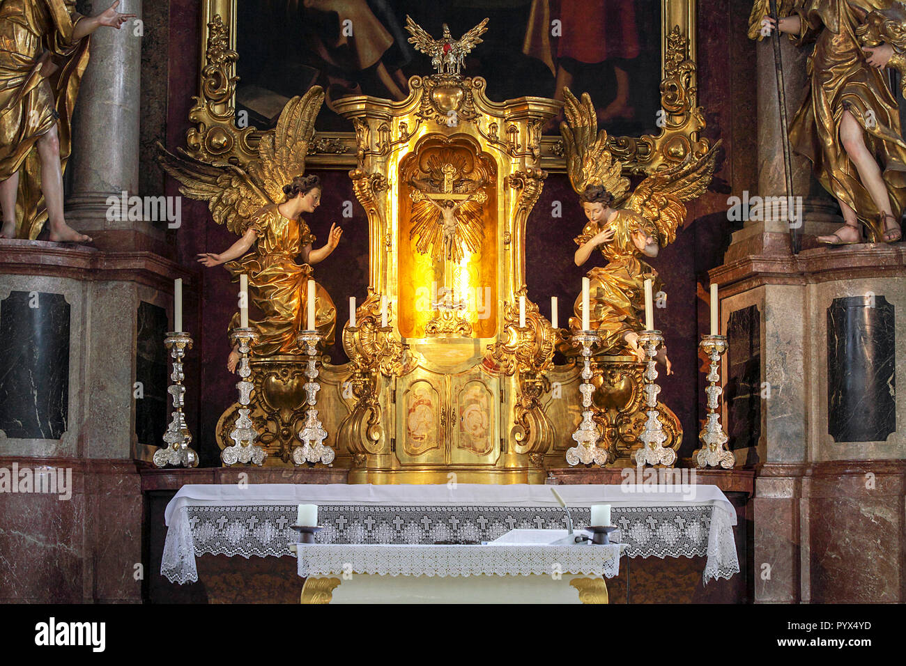 Beautifully gilded altar set within the 14th century Heiliggereistkirche Church in Munich, Germany. Stock Photo