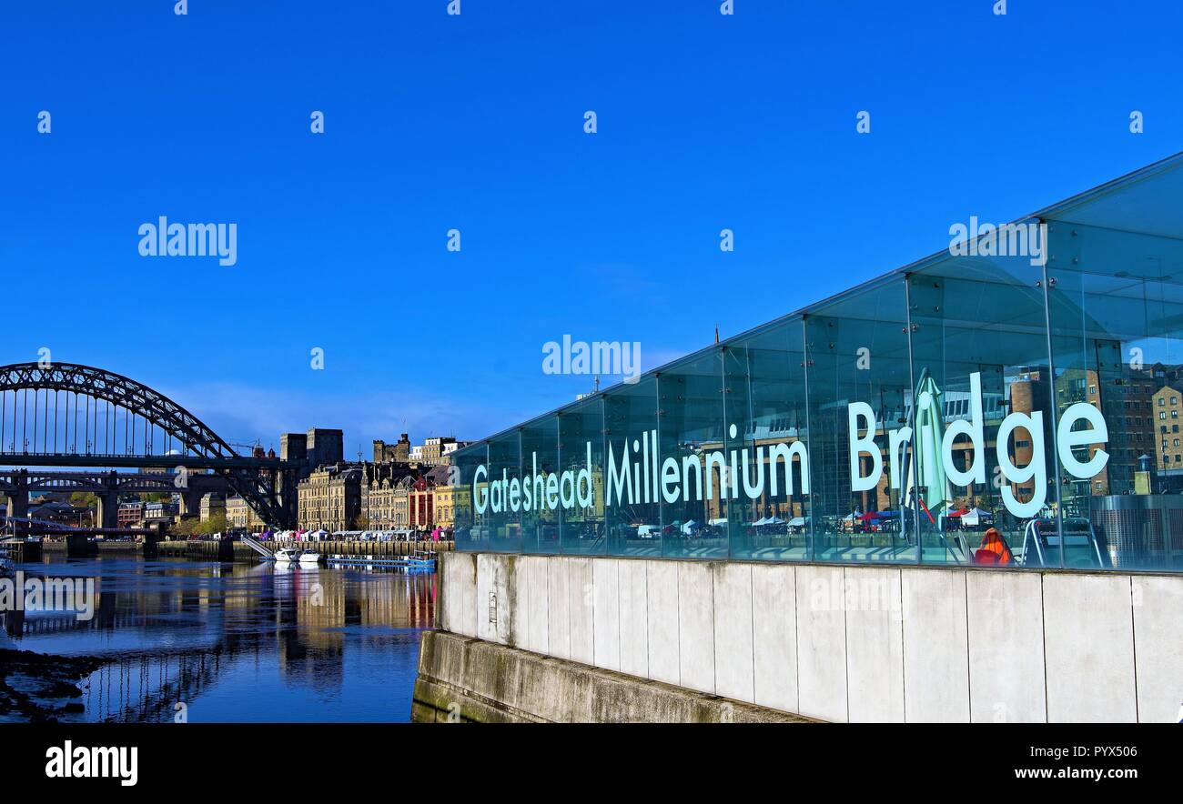 Perfect blue skies over the River Brew, creating pristine reflections of the interesting architecture in Gateshead. Stock Photo