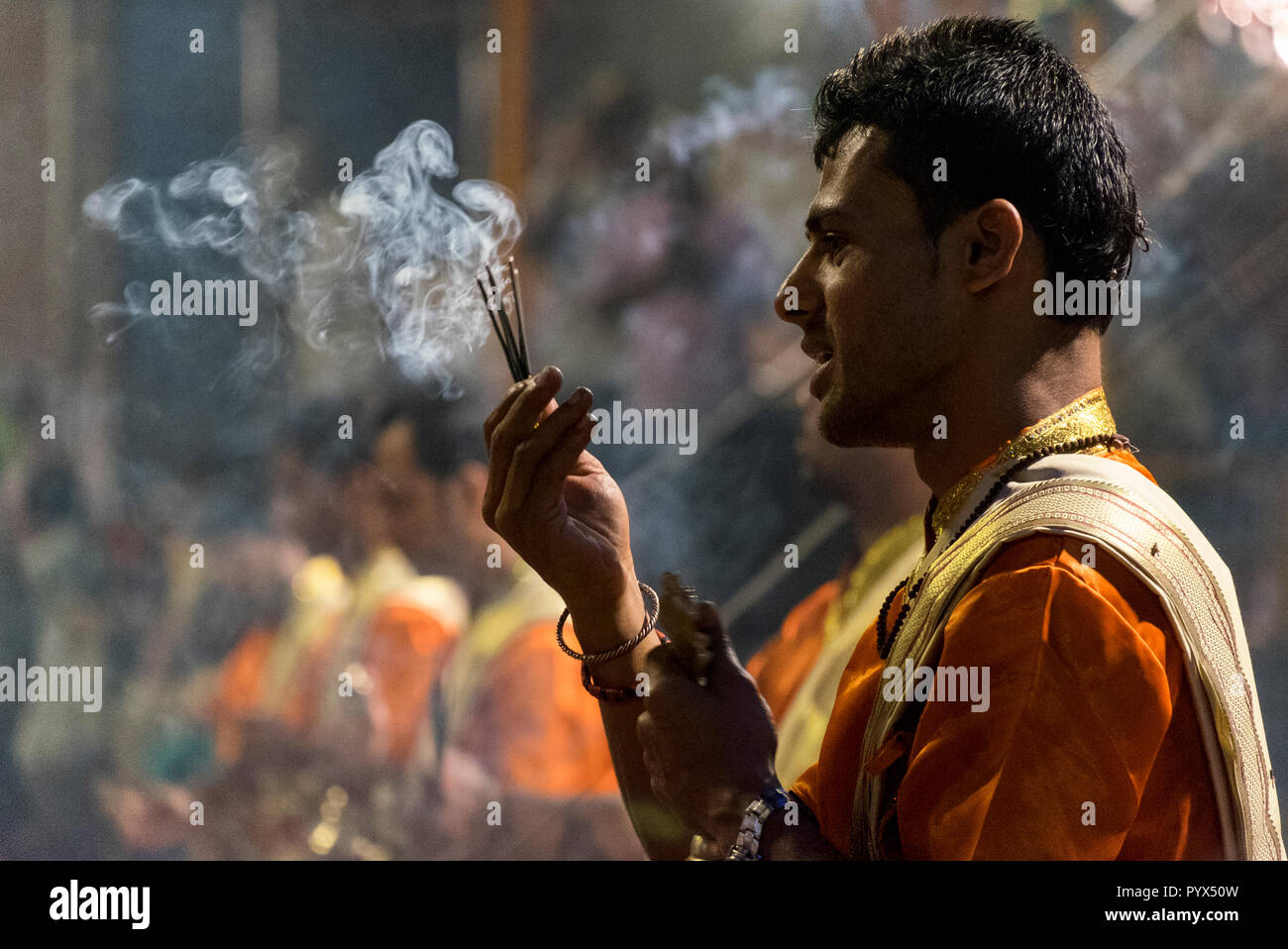 Priest Performing Ganga Aarti In Varanasi Stock Photo - Alamy