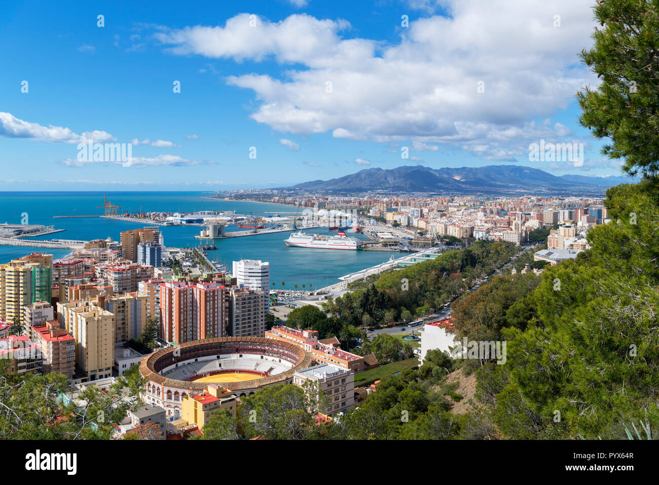 Malaga, Spain. View over the city from the Castillo Gibralfaro with the Bull Ring in the foreground, Malaga, Costa del Sol, Andalucia, Spain Stock Photo