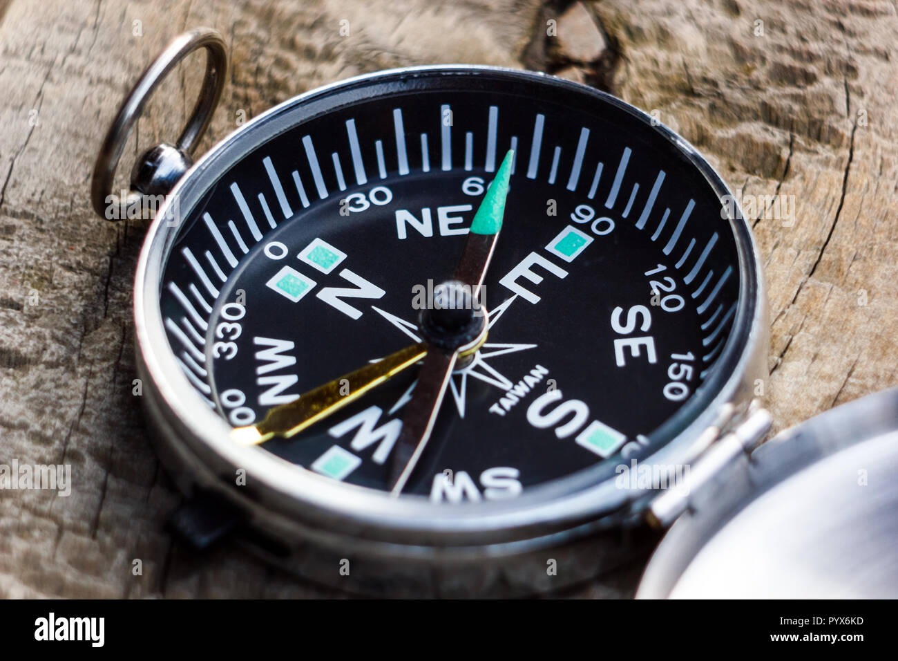 A magnetic compass indication the right direction of the earth's north pole Stock Photo