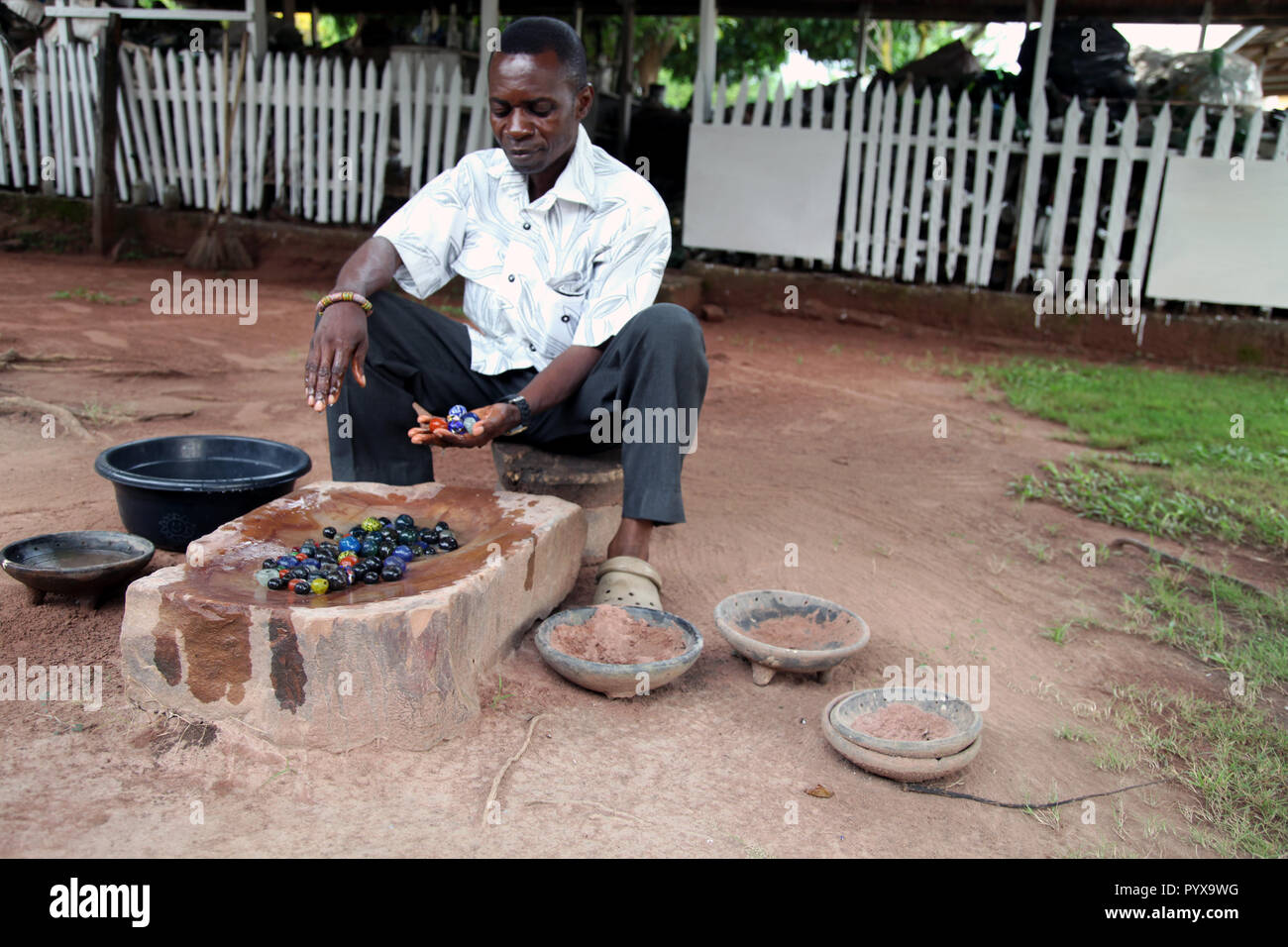 Colored glass bead fabrication at Cedi Bead Factory, Krobo Odumasi