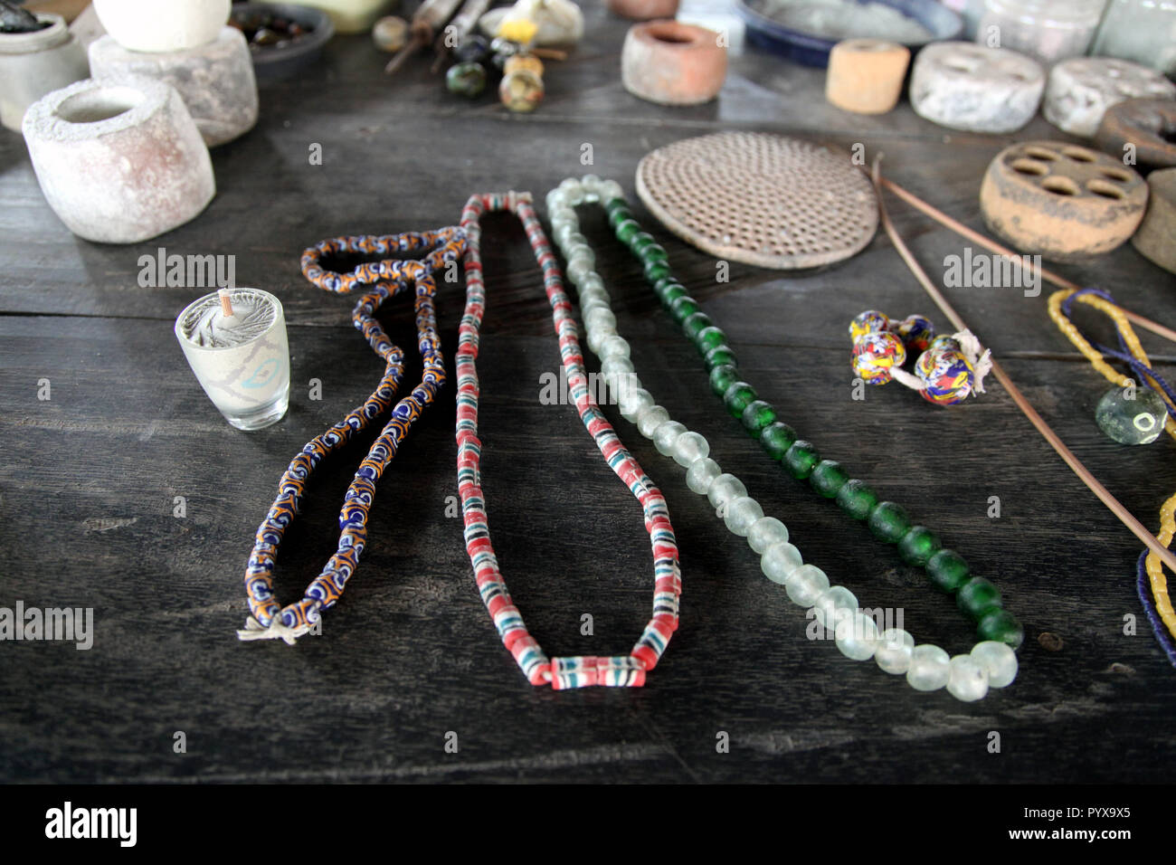 Colored glass bead fabrication at Cedi Bead Factory, Krobo Odumasi