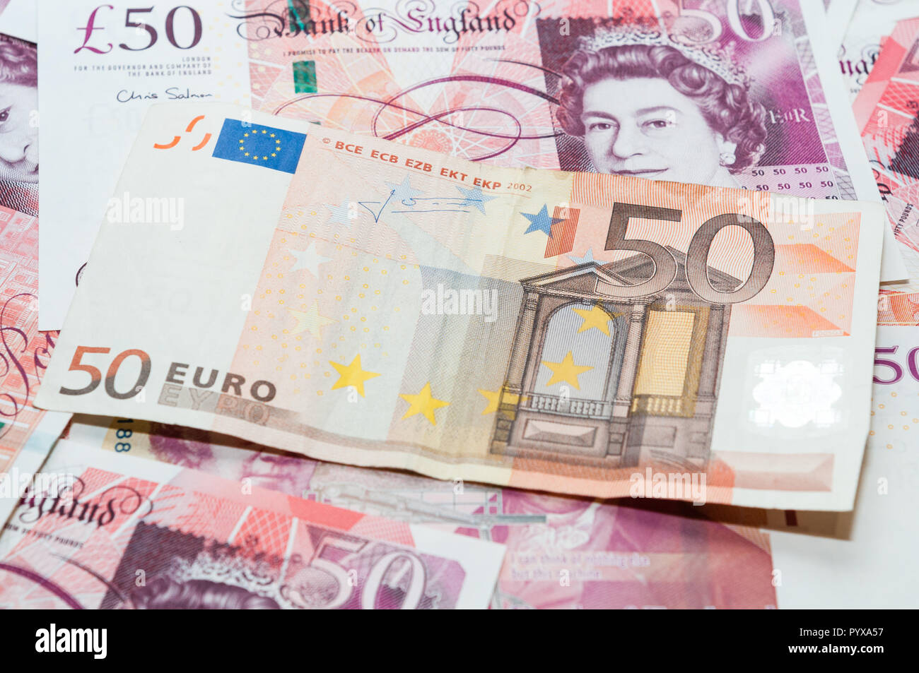 UK and EUR currency, 50 pounds and 50 euros Stock Photo