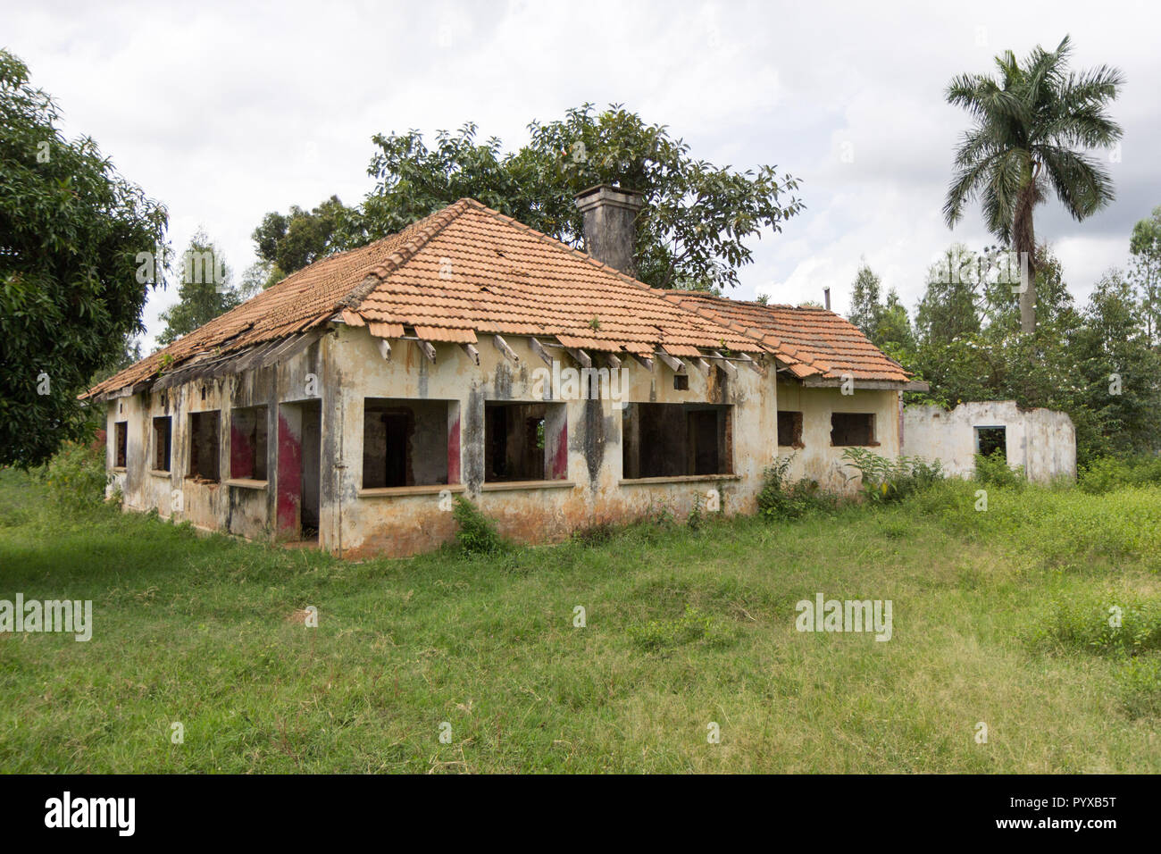 An abandoned house in ruins. Photo taken in Ssezibwa, Uganda on 23 April 2017. Stock Photo