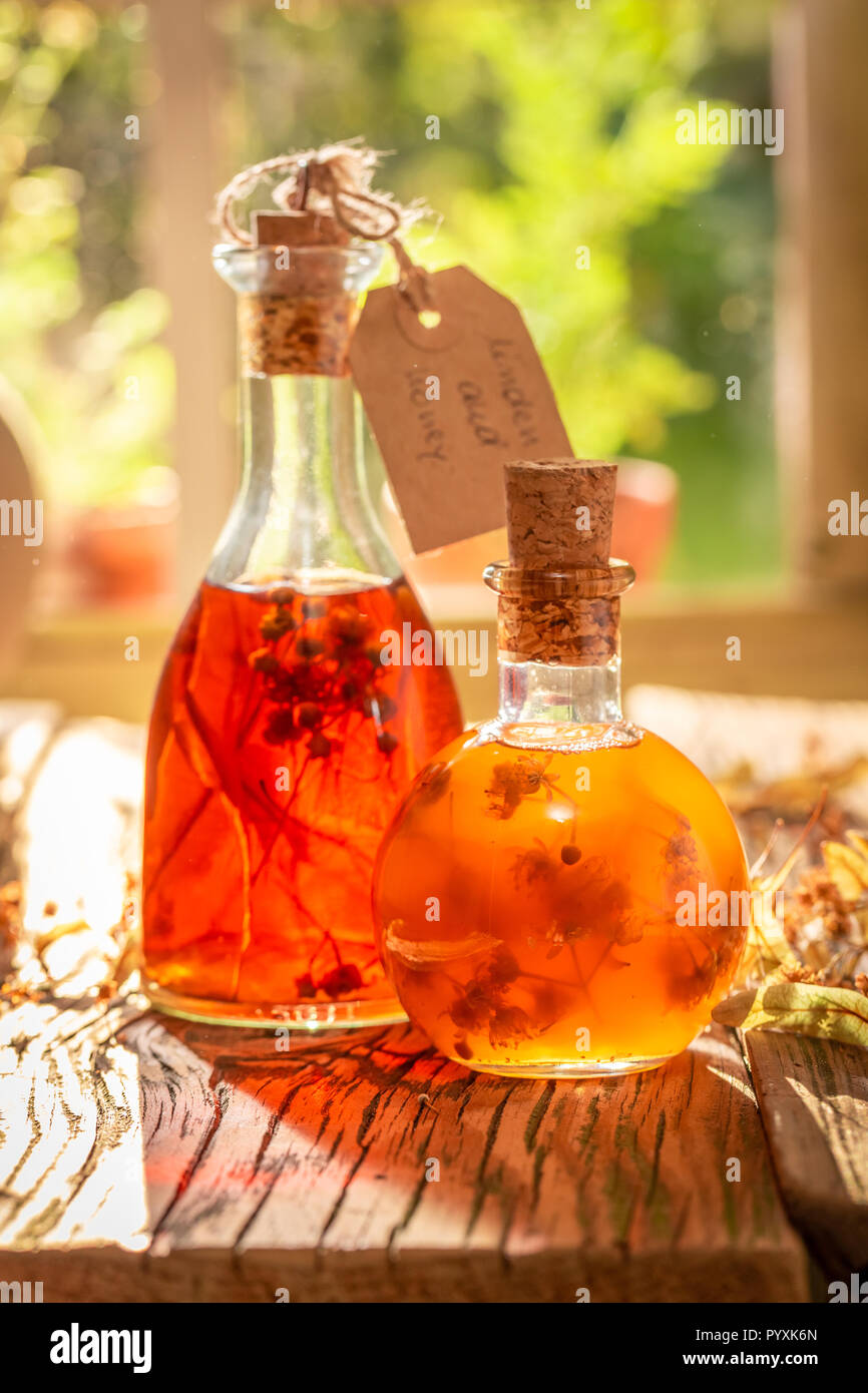 Strong quince tincture made of honey and linden Stock Photo