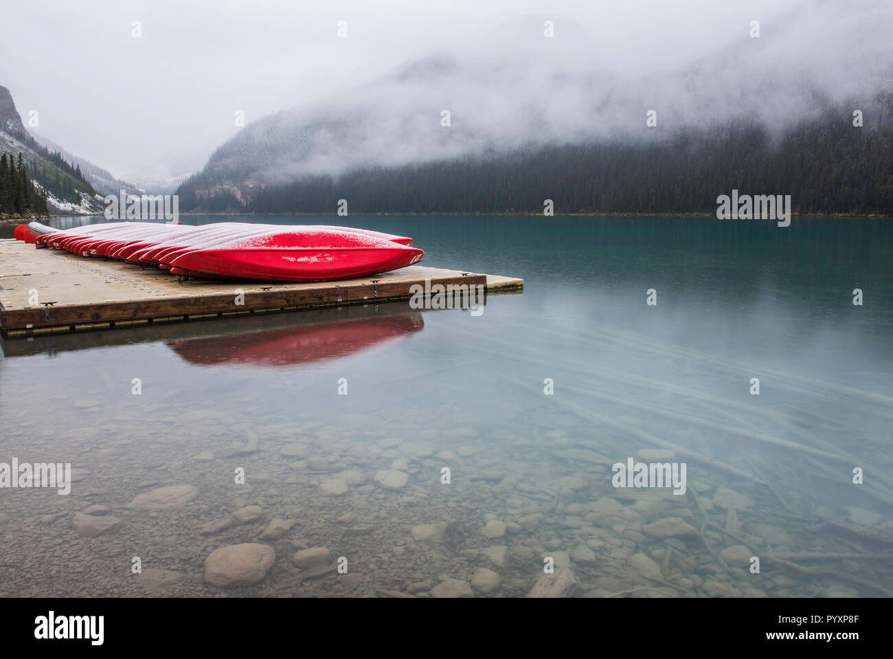 Canoes, Lake Louise, Banff NP, Alberta, Canada, by Bruce Montagne/Dembinsky Photo Assoc Stock Photo