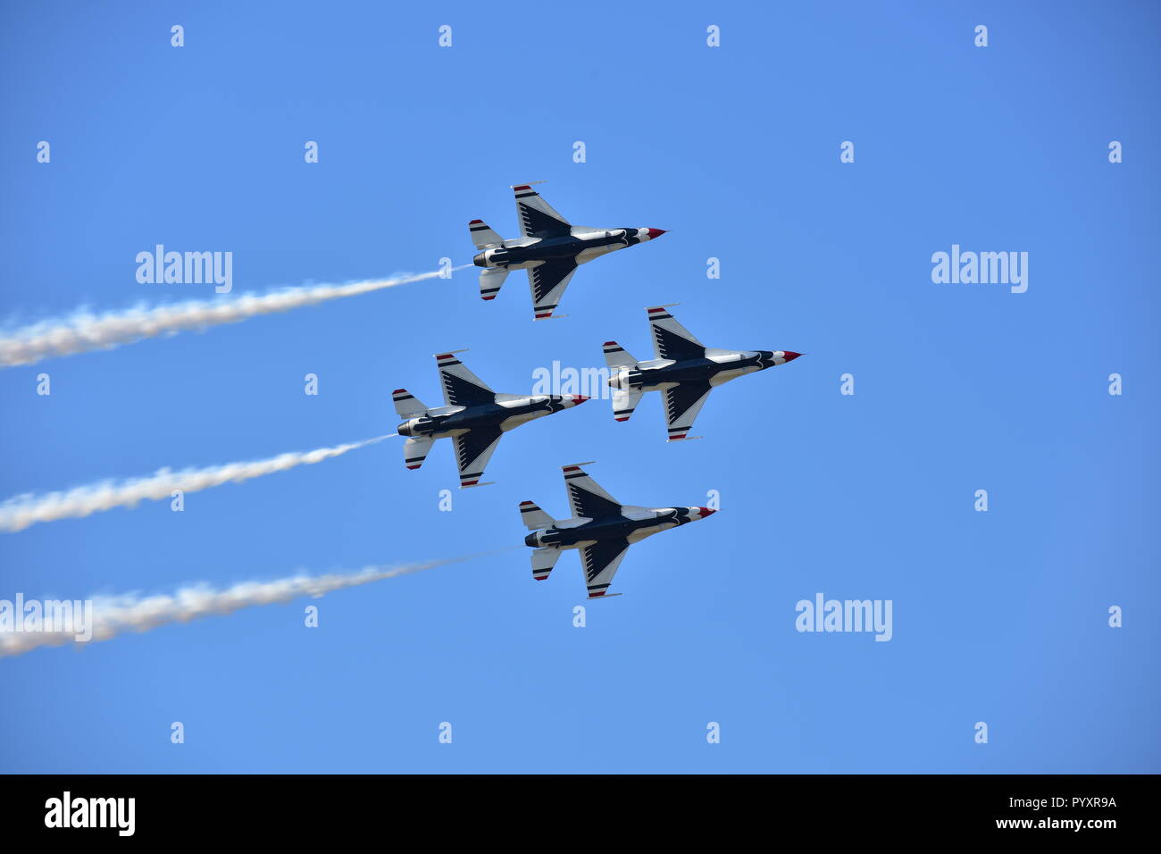 The U.S. Air Force Thunderbirds fly in formation during an aerial act