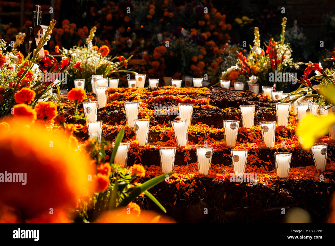 Layers of marigold petals and votive candles adorn the Patzcuaro