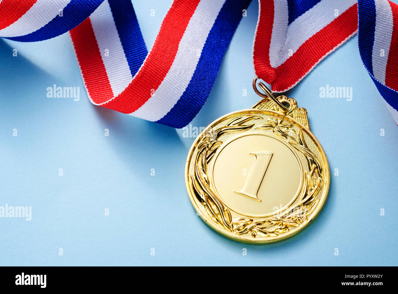 Gold medal 1 place with a ribbon Stock Photo