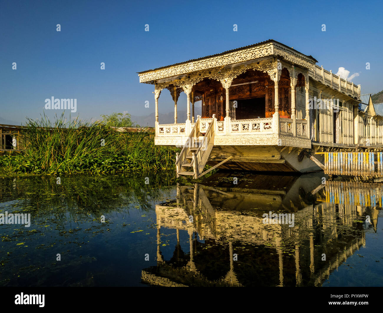 Houseboots on Dal Lake are most popular to accomodate tourists in Srinagar Stock Photo