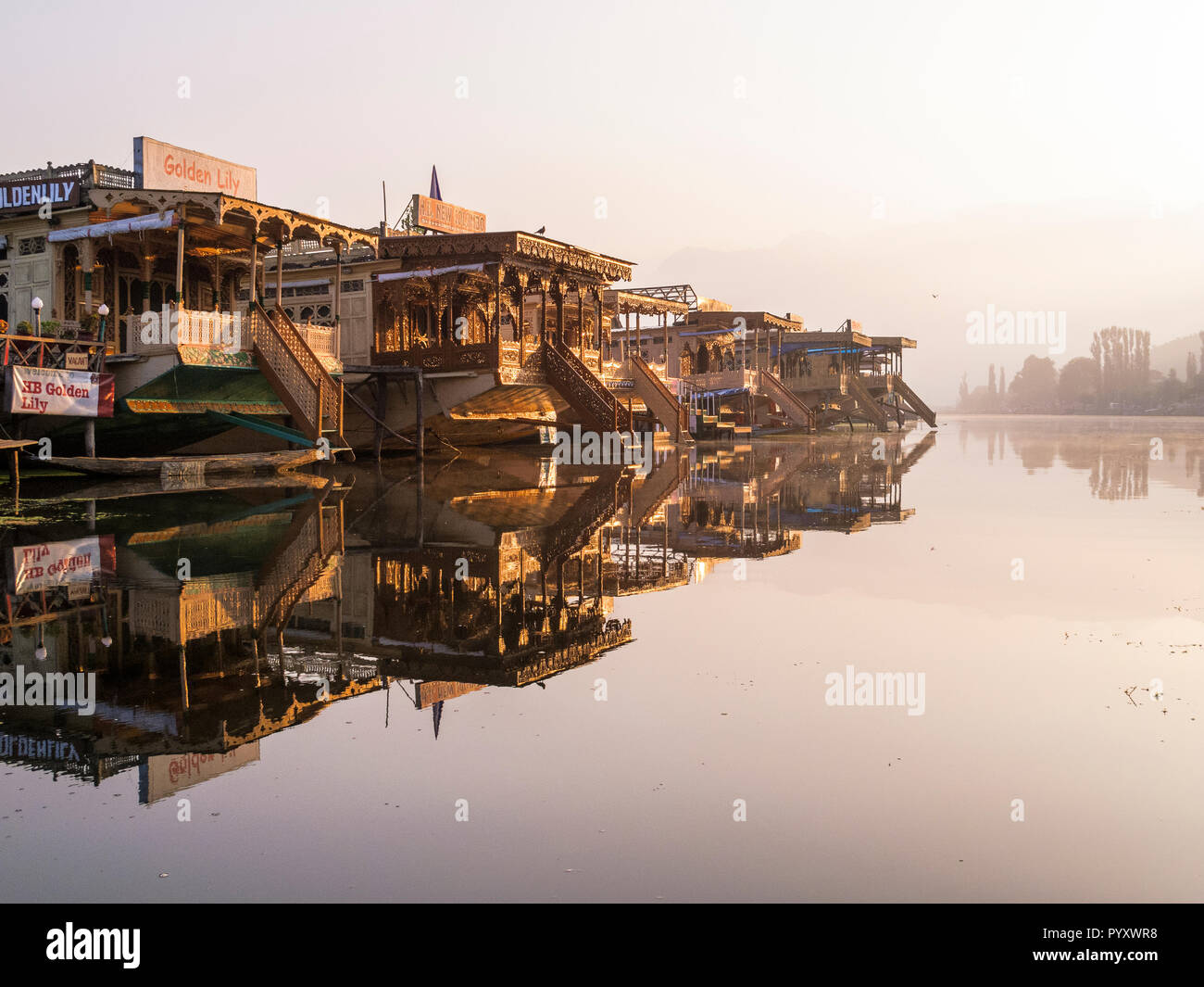 Houseboots on Dal Lake are most popular to accomodate tourists in Srinagar Stock Photo