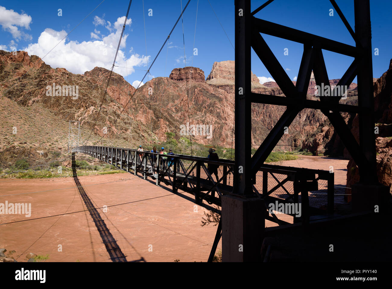 Silver Bridge connects the Bright Angel Trail to Phantom Ranch by crossing the Colorado River in the Grand Canyon, Arizona, USA. Stock Photo