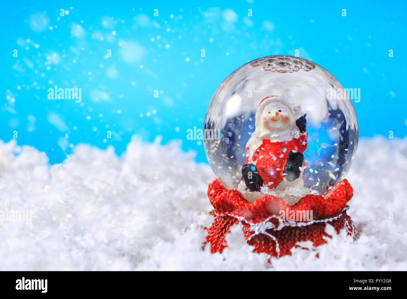 Christmas snow globe on snow,Useful as Christmas background card Stock