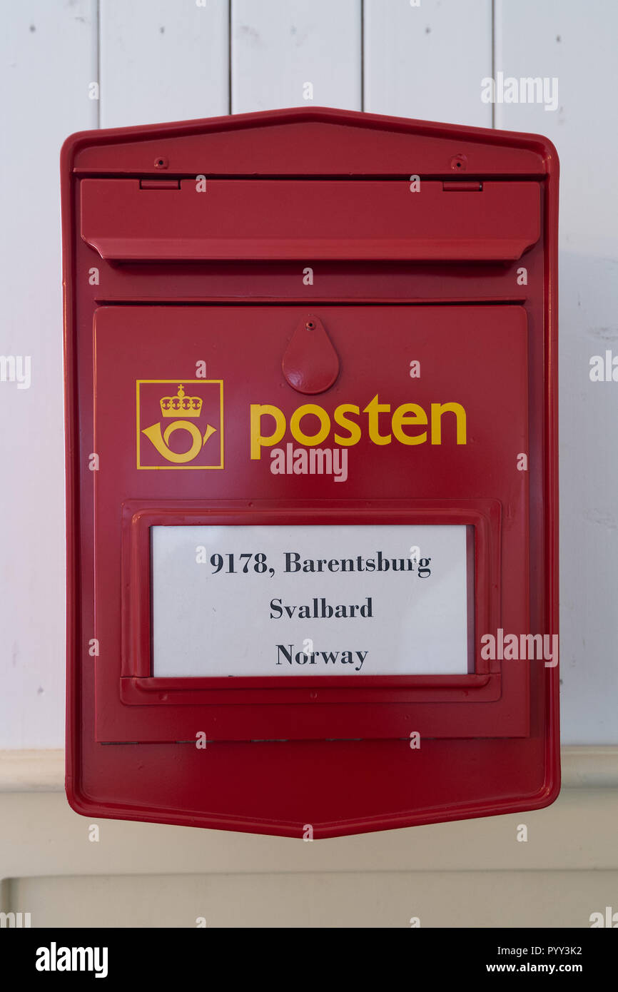 Red mailbox, Russian miners' settlement Barentsburg, Isfjorden, Spitsbergen, Svalbard, Norway Stock Photo