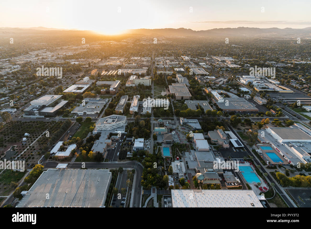 Los Angeles, California, USA - October 21, 2018:  Aerial sunset view of California State University Northridge campus facilities in the San Fernando V Stock Photo