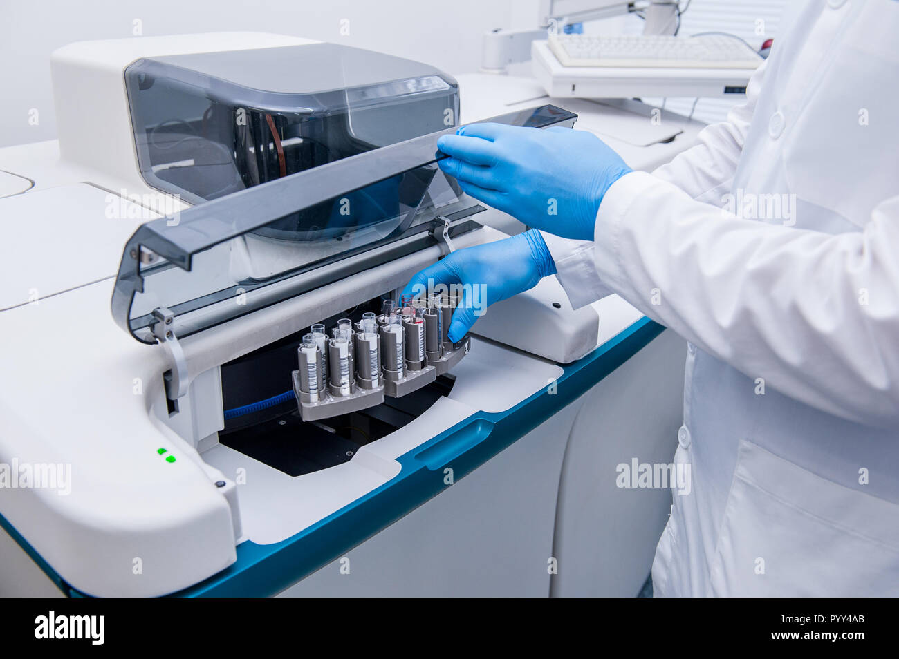 Close up scientist doing chemical test in modern laboratory. Selective ...