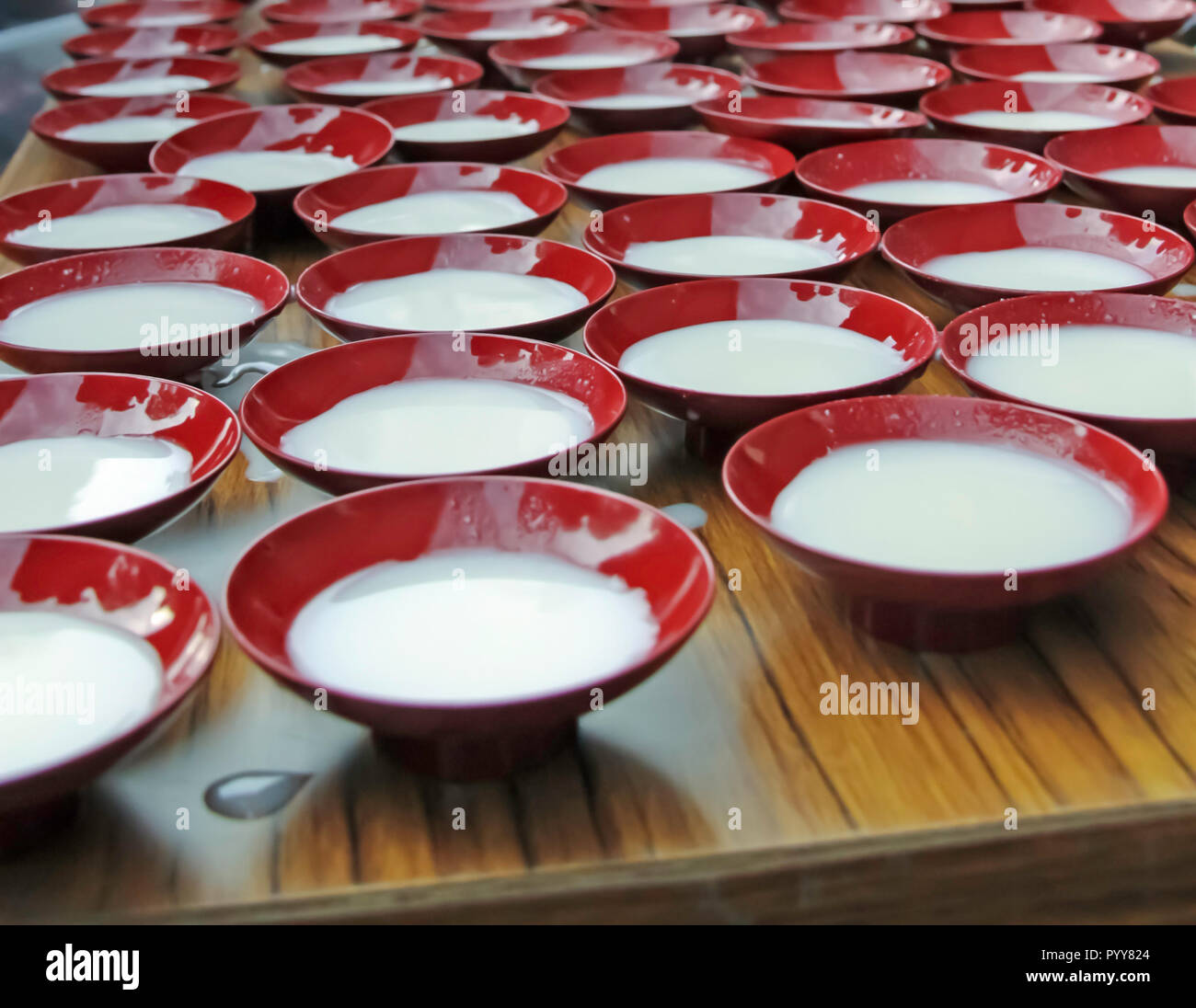 Japanese milk pudding in traditional porcelain bowls Stock Photo Alamy