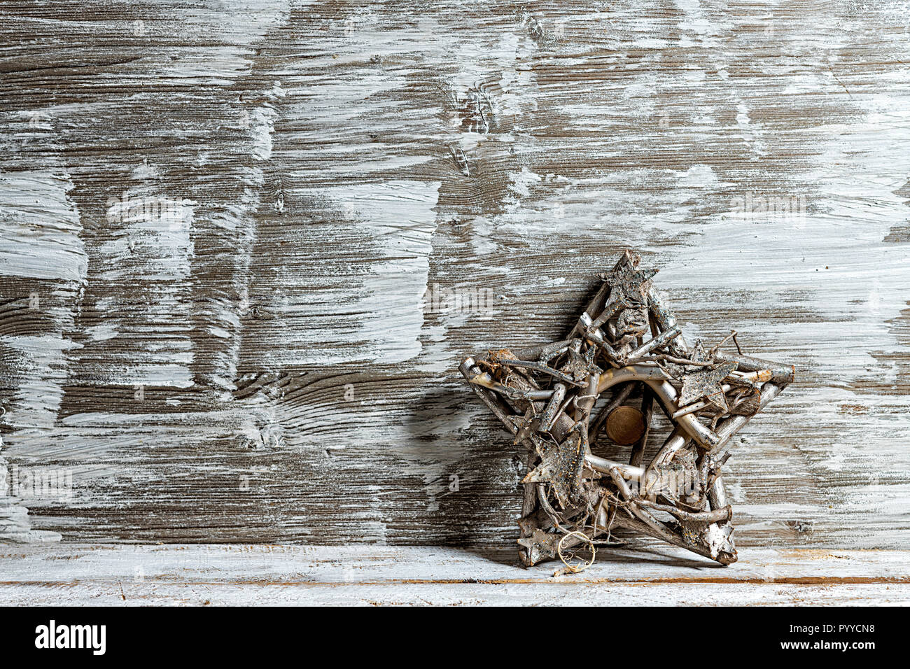 Christmas star on old vintage wooden table Stock Photo