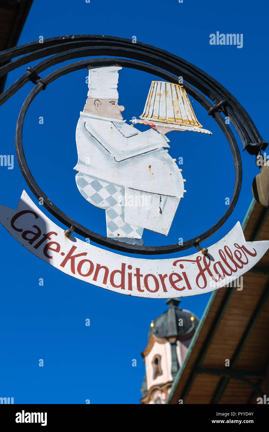 Café, guild emblem, big pastry chef with opulent cake, Mittenwald, Upper Bavaria, Bavaria, Germany, Europe, Stock Photo