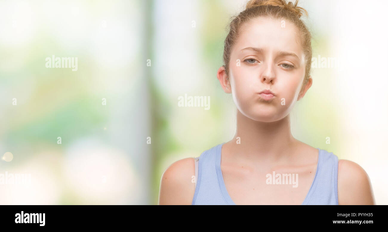 Woman cheeks puffing hires stock photography and images Alamy