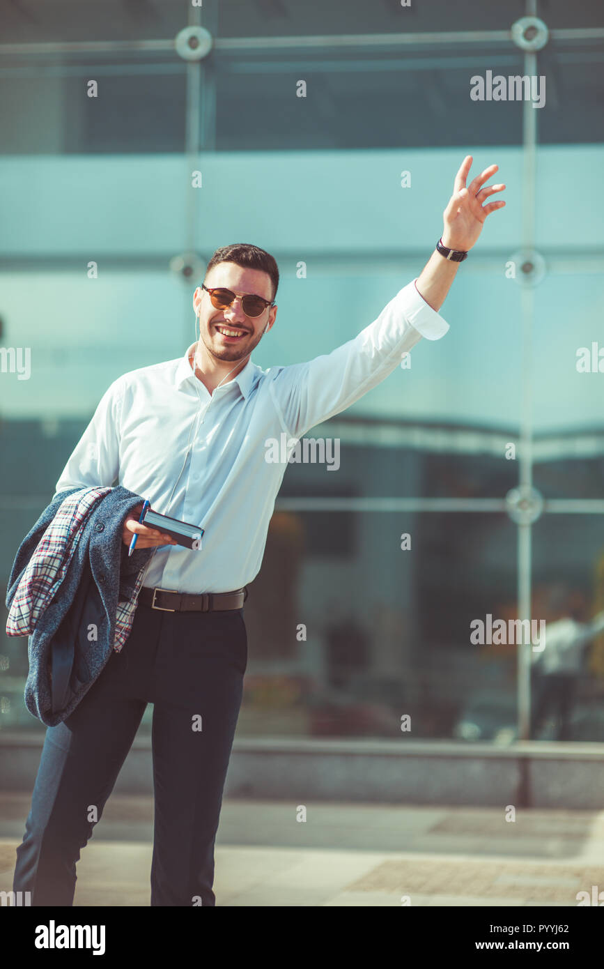 Waving to someone on the street hi-res stock photography and images - Alamy