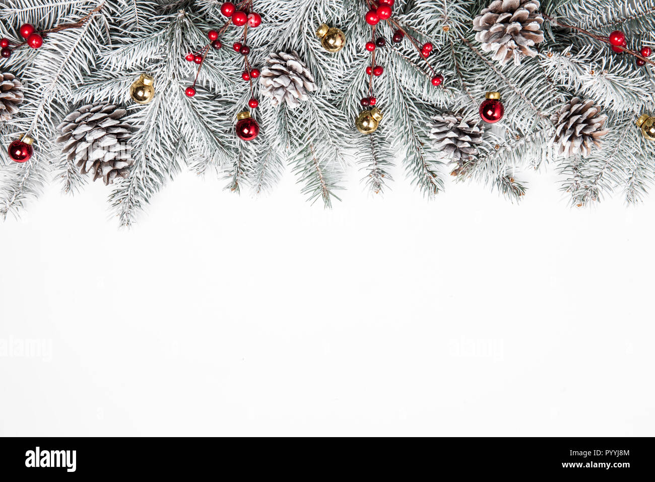 Christmas background with snow fir tree and decoration. Top view with ...