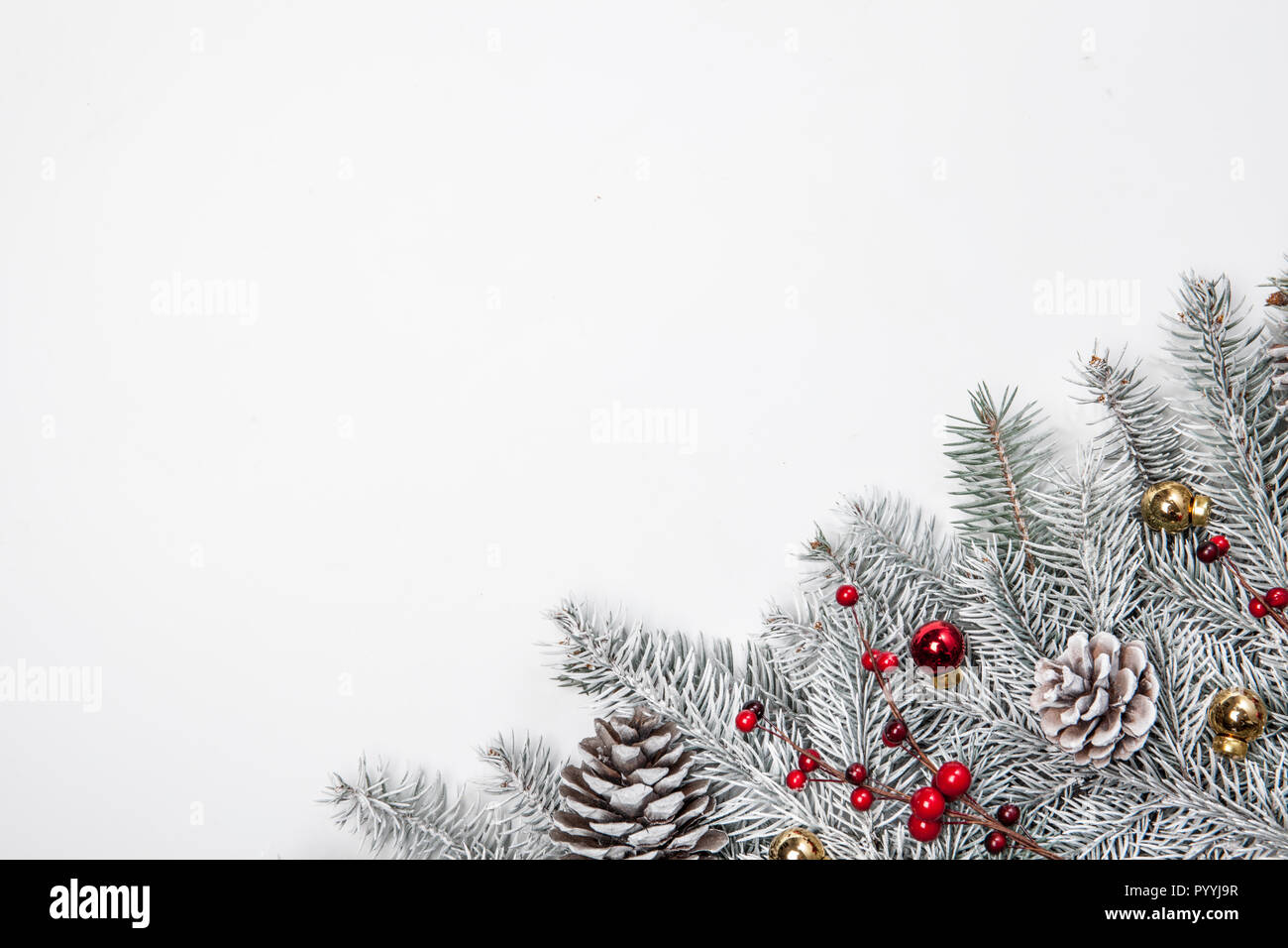 Christmas background with snow fir tree and decoration. Top view with ...